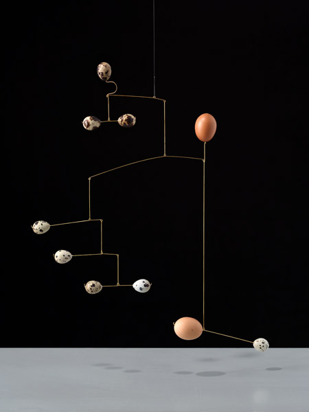 Image of Hanging Mobile made with eggs by Carl Kleiner in an homage to Alexander Calder