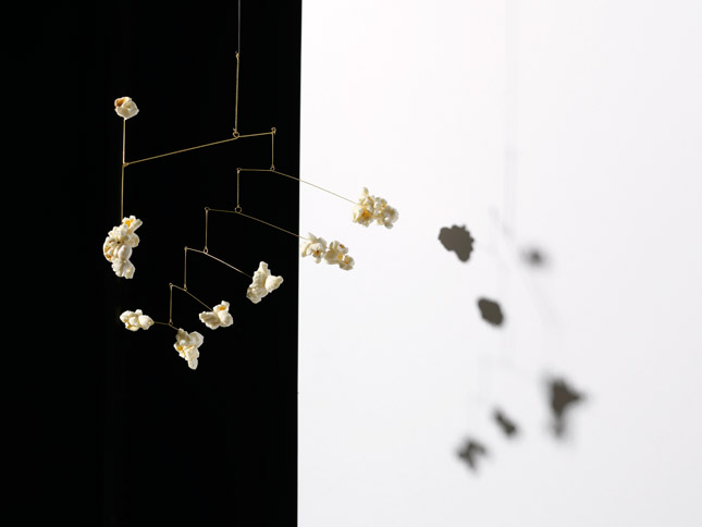 Image of Hanging Mobile made with popcorn by Carl Kleiner in an homage to Alexander Calder